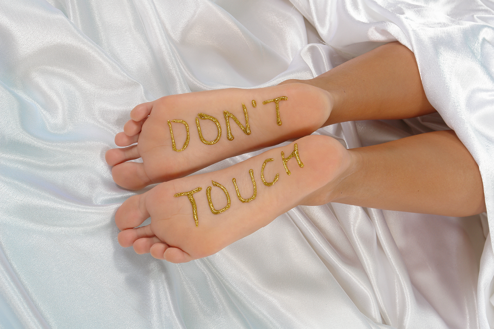 Don&#039;t Touch Sign on Ticklish Feet